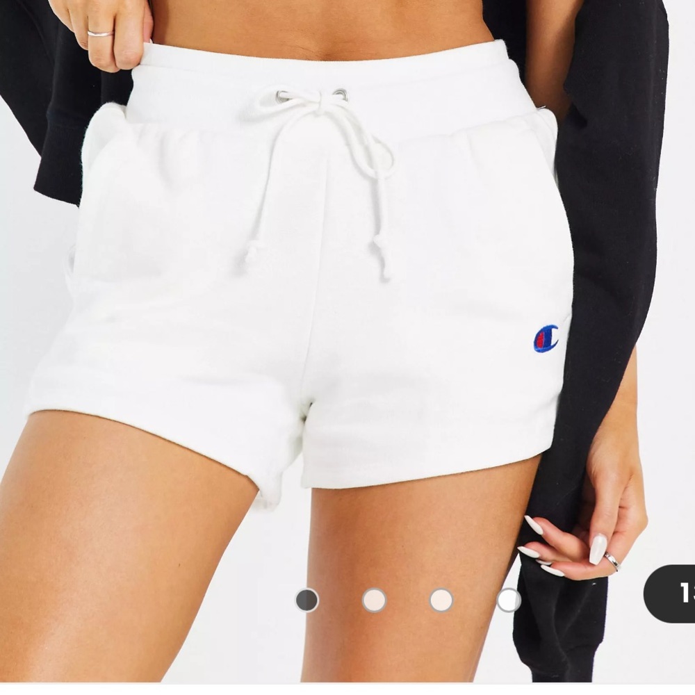 Never worn champion shorts in white xs